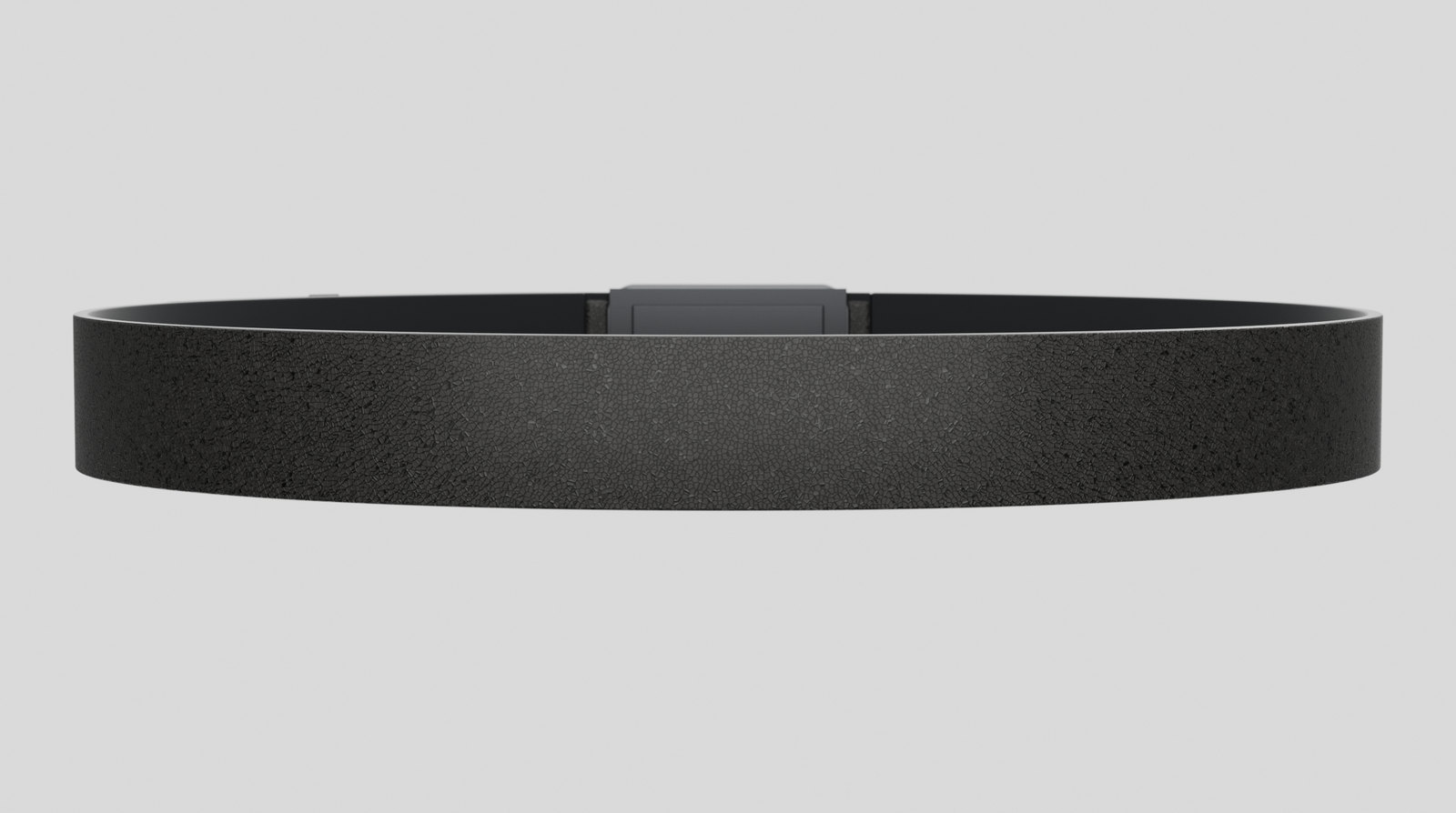Body side of the Vyldor belt, showing the microfibre liner over the haptic zones and the rear electronics spine
